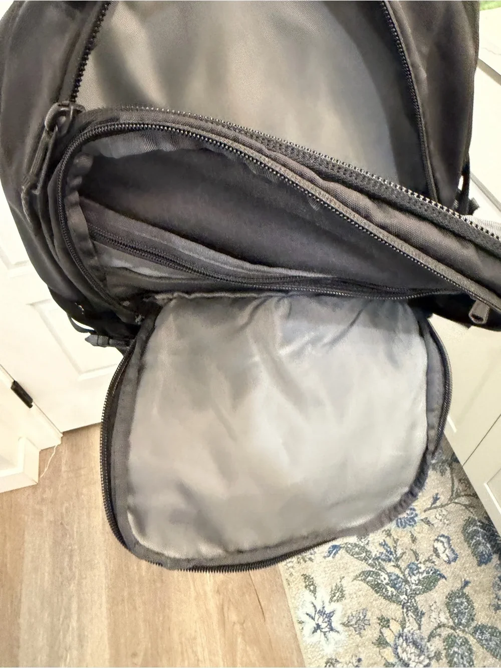 The North Face Black Backpack with Front Pocket and Buckle Straps